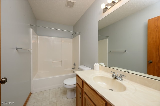 full bathroom featuring vanity, bathtub / shower combination, a textured ceiling, and toilet