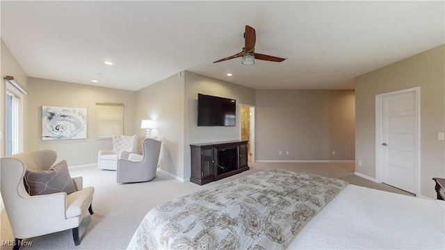 carpeted bedroom featuring ceiling fan