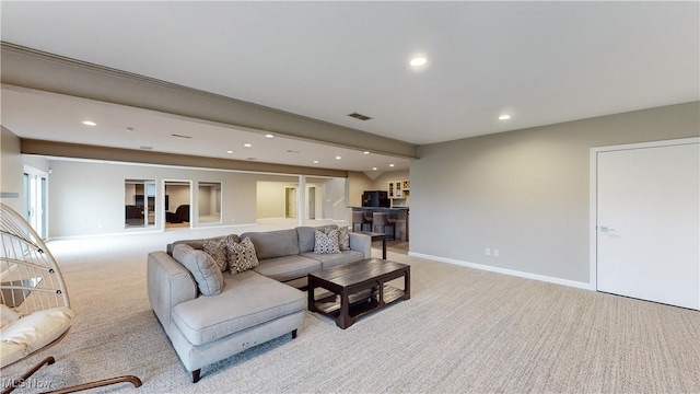 living room featuring light carpet