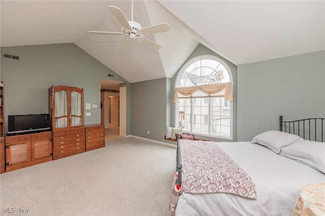 bedroom with carpet flooring, vaulted ceiling, and ceiling fan