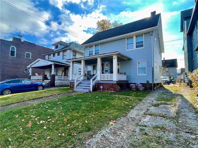 view of front of home featuring a porch and a front yard