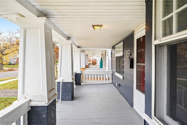 wooden terrace with covered porch