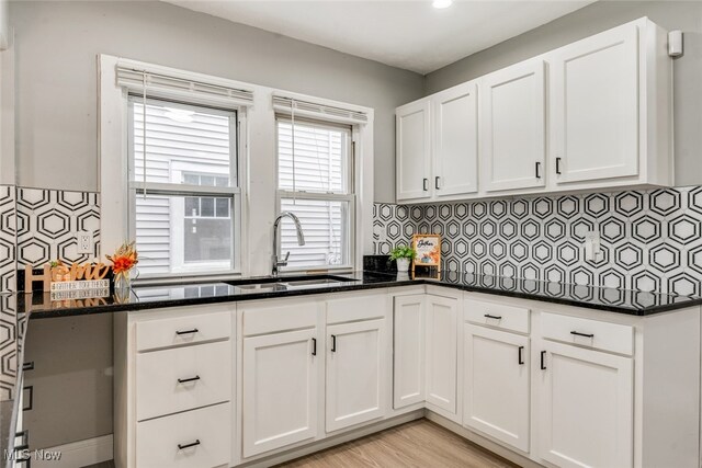 kitchen with white cabinets and sink