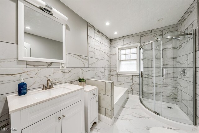 bathroom with vanity and a shower with shower door