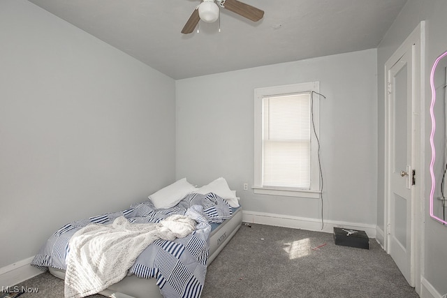 carpeted bedroom featuring ceiling fan