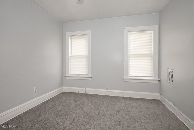 view of carpeted spare room