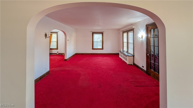 spare room featuring carpet