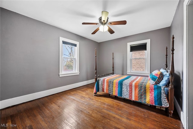 bedroom featuring wood-type flooring and ceiling fan