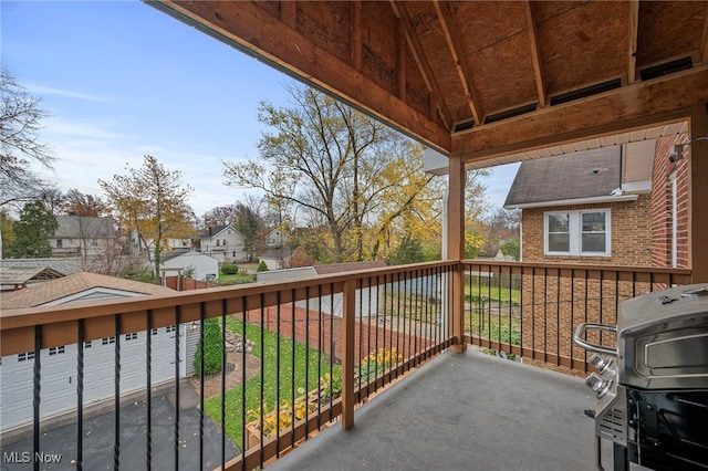 balcony featuring area for grilling