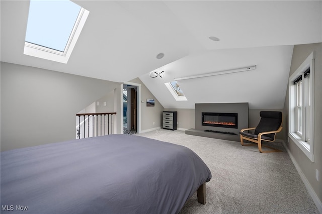 bedroom with light colored carpet and vaulted ceiling