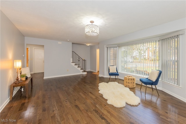 living area with dark hardwood / wood-style flooring