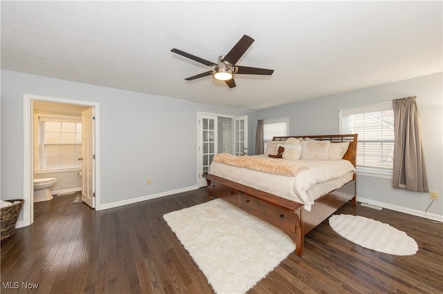 bedroom featuring ceiling fan, ensuite bathroom, and dark wood-type flooring