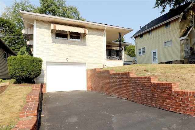 view of side of property featuring a garage