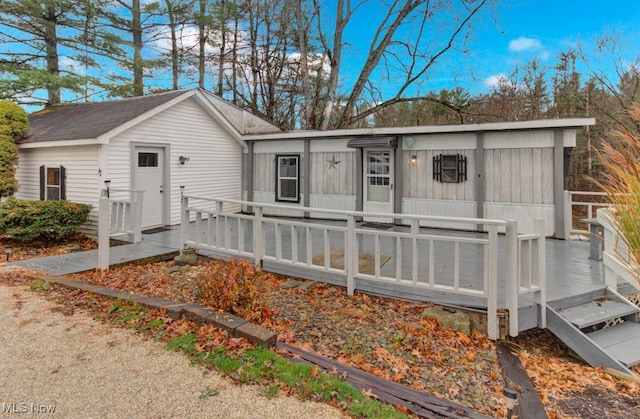 view of front of property featuring a wooden deck