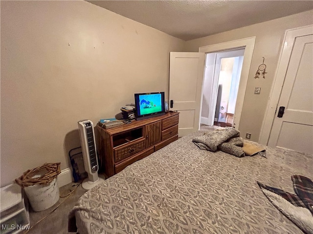 bedroom featuring a textured ceiling