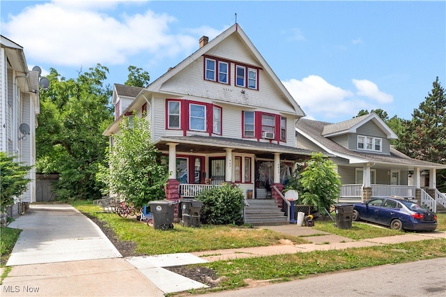 view of front of property featuring covered porch