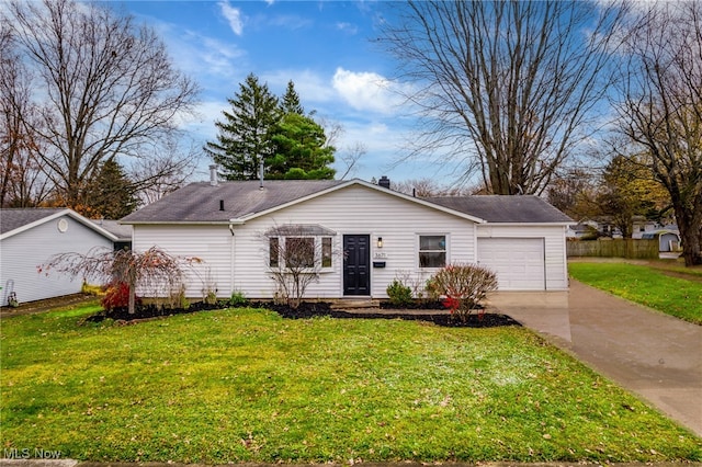 ranch-style home with a front yard and a garage