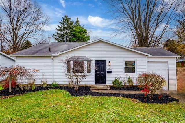 ranch-style house with a front lawn and a garage