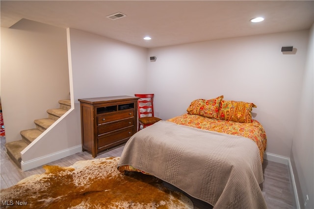 bedroom featuring light hardwood / wood-style flooring