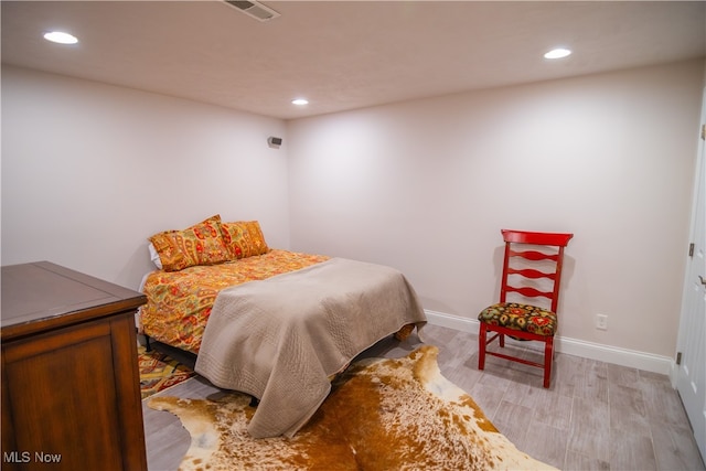 bedroom featuring light hardwood / wood-style flooring