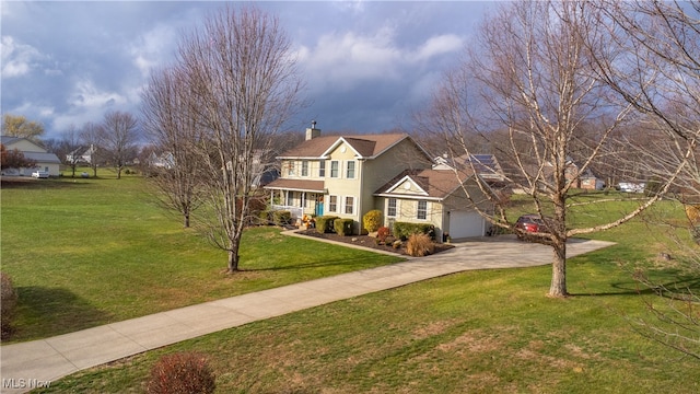 colonial house with a front yard and a garage