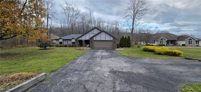 view of front facade featuring a front yard and a garage