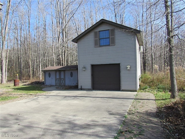 view of property exterior with a garage