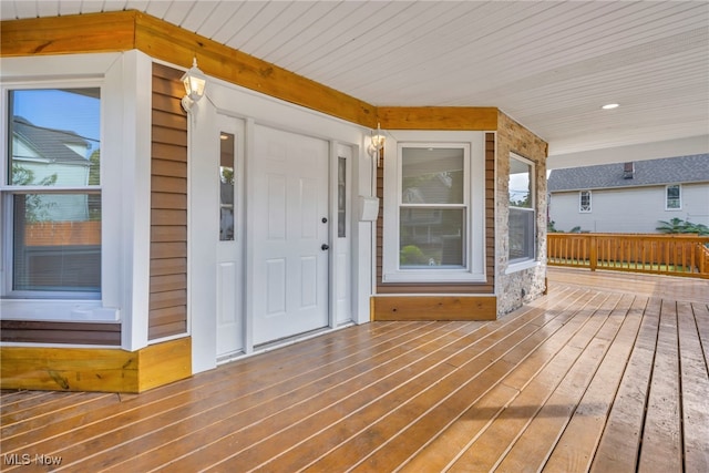 wooden terrace with a porch