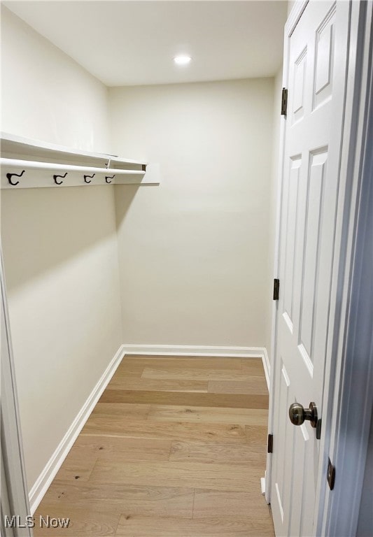 walk in closet featuring light wood-type flooring