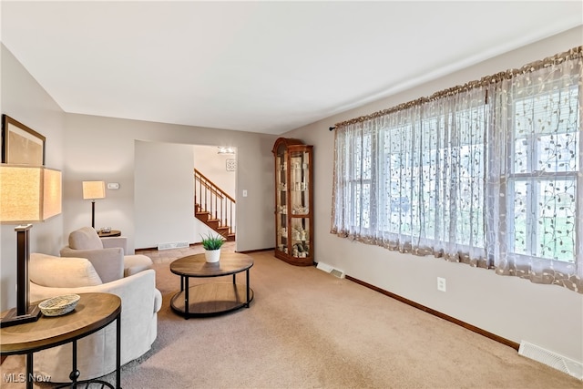 sitting room with carpet floors