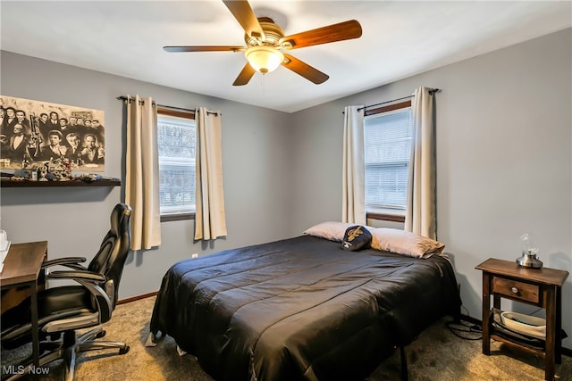 carpeted bedroom with ceiling fan