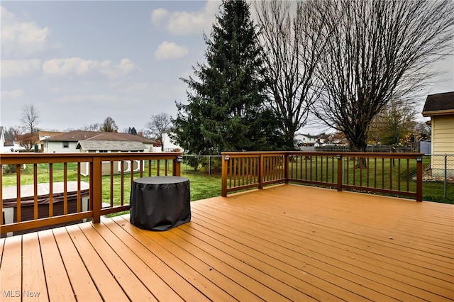 deck featuring a lawn