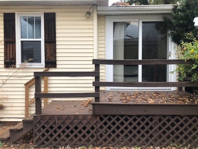 view of side of property with a deck