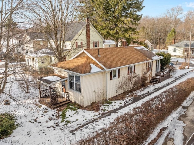 view of snow covered property