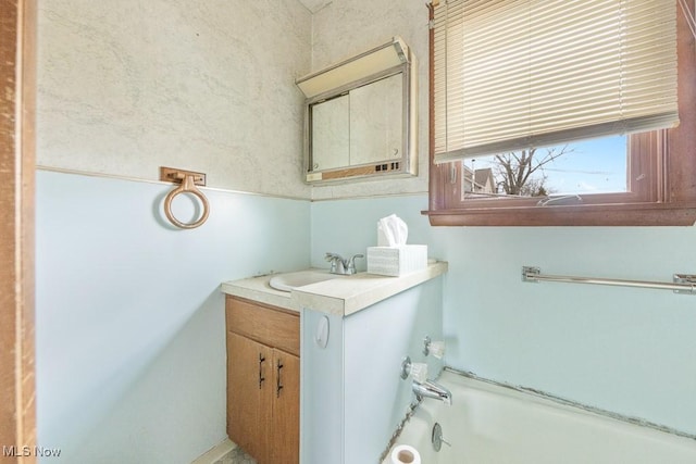 18061 Derr Ave, Beloit, OH 44609 - bathroom with vanity and a bath
