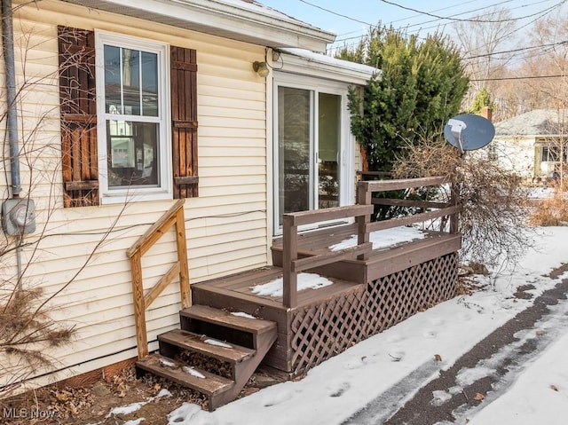 view of snow covered deck