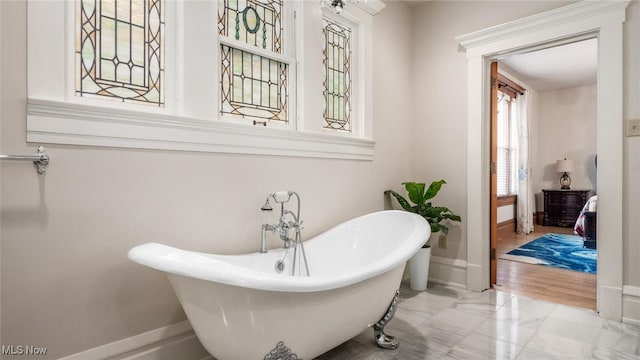 bathroom featuring a tub and wood-type flooring