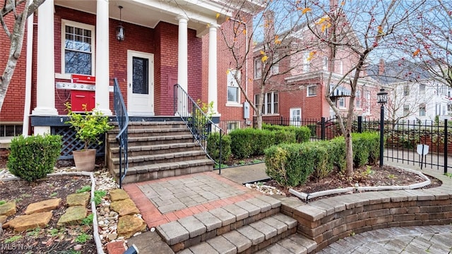 doorway to property with a porch