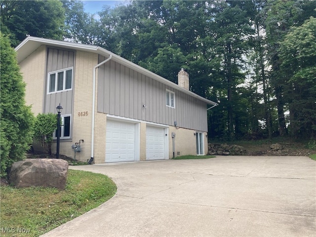 view of property exterior with a garage