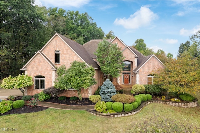 view of front property with a front lawn