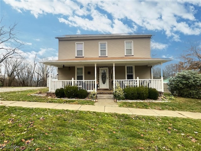 view of front of home featuring a front yard