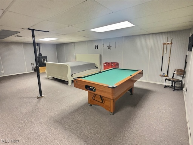 rec room with a paneled ceiling and carpet floors