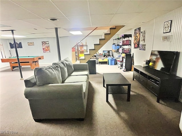 living room featuring a drop ceiling and billiards