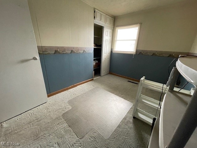 bathroom with a textured ceiling