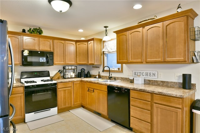 kitchen featuring hanging light fixtures, sink, light tile patterned flooring, and black appliances