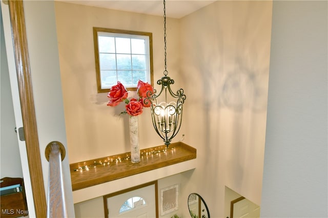 interior details with an inviting chandelier