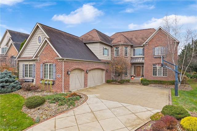 view of front of property featuring a garage