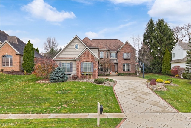 front facade with a front yard