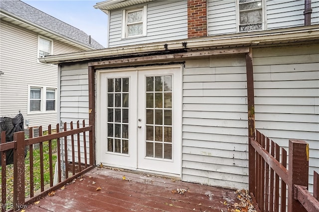 entrance to property with french doors and a deck