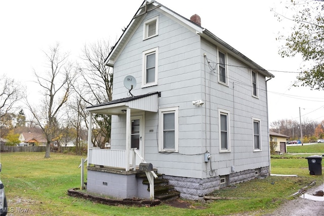 exterior space featuring a front lawn